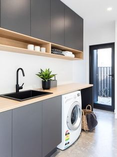 a washer and dryer in a small room