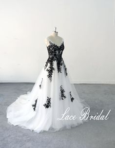 a black and white wedding dress on display