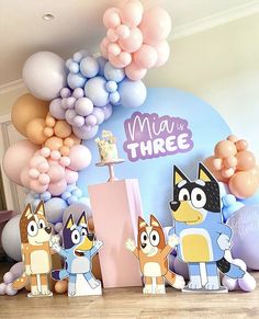 some cartoon characters are standing in front of balloons