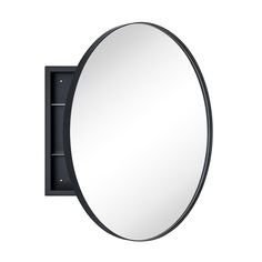 an oval mirror mounted to the side of a wall