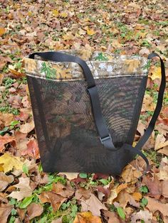 This listing is for a medium bag. (patterns vary)  pattern either yellow flower, camo, pink camo, cream/green plaid, red, green Bags are made from a heavy duty screen that is tear resistant and will allow for spores to disperse. they are great for the beach, sand falls right through. Also prduce, berry picking, rock collecting, ect. They have a nylon strap to go across the body for hands free picking (some sizes are adjustable).  Colors depend on what is available to me. Once I sell through a color I can not guarantee more will be available.  Sizes: Basic- approximately 12" x 11.5" with a non-adjustable strap $12.00  Small- (cut size 12"x 12") Finished size approximately 10"x7"x4" with adjustable strap $14.00 medium - (cut size 15"x 15") Finished size approximately 13"x9"x5" with adjustabl Durable Black Square Shoulder Bag, Black Square Shoulder Bag For Outdoor, Outdoor Square Bags With Large Capacity, Square Outdoor Bags With Large Capacity, Rectangular Bags With Top Carry Handle For Outdoor Activities, Rectangular Bag With Top Carry Handle For Outdoor Activities, Rectangular Bag With Top Carry Handle For Outdoor, Practical Camping Backpack, Camouflage Bag With Adjustable Strap For Everyday Use