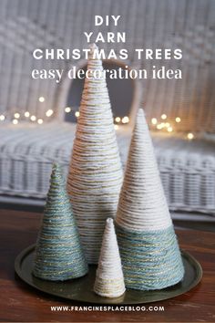 yarn wrapped christmas trees on a plate with text overlay that reads diy yarn christmas trees easy decoration idea