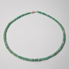 "Natural Emerald Beaded Necklace in 925 Sterling Silver Details: Gemstone: Emerald Av Gemstone dimensions: 3 mm Total length for each item: 40 cm / 15.7\"  + extends to 45 cm/ 18\" Check out the full catalogue of beaded necklaces here: https://www.etsy.com/shop/PaleoGemsJewellery?section_id=40958762 Please note; Our jewelry pieces crafted with genuine stones, so there may be slight variations in color and shape from the images shown.   Caring for gemstones: Always store your jewellery pieces individually. To maintain the gemstone's natural appearance, wash it with warm water and dry it i with a soft cloth. Avoid exposure to excessive amounts of heat and soap. Take care not to loosen or disturb the jewellery setting. Remember to  protect your jewelry from impact against hard surfaces and av Silver Faceted Round Beads Gemstones, Sterling Silver Rondelle Gemstone Beads Jewelry, Sterling Silver Gemstone Bead Necklace, Sterling Silver Faceted Round Bead Necklaces, Sterling Silver Faceted Round Beads Necklace, Sterling Silver Crystal Necklace With Round Beads, Sterling Silver Necklace With Faceted Round Beads, Faceted Round Bead Sterling Silver Necklace, Sterling Silver Rondelle Beads For Jewelry Making