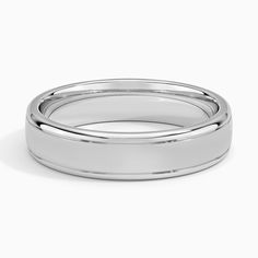 two wedding bands are shown in white gold