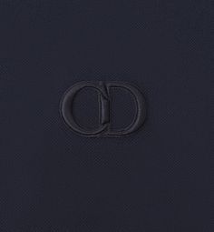 The polo shirt is a timeless and relaxed piece. Crafted in navy blue cotton piqué, it is embellished with a tonal CD Icon embroidery on the chest. The style has a regular fit and pairs easily with any jeans.. Cd Icon, Denim Swimsuit, Dior Star, Icon Shoes, Dior Book Tote, Short Denim, Star Shoes, Tshirt Skirt, Silver Cufflinks