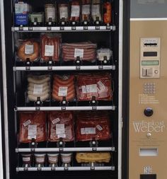 a vending machine in germany with the words america needs to step up its meat game