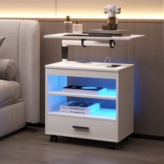 PRICES MAY VARY. ✅[Auto ON/OFF LED Light] - This smart nightstand has 3 colors: white / blue / warm light with 10-100% dimming brightness. It can auto-turn ON/OFF by human body induction. When people approach, the light turns on, and when people leave, the light turns off. You can choose different lights as needed and scenes, making your home looks more modern and fashionable. ✅ [Socekts & USB Ports] - Bedside table with 2 Standard Plug Outlets & 2 USB Charging Ports, allows you easily to charge Wooden Bed Side Table, Bed Side Table Design, Stand For Bedroom, Nightstand With Charging Station, Storage Furniture Living Room, Laptop Tray, Side End Table, Modern Bedside Table, Storage Furniture Bedroom