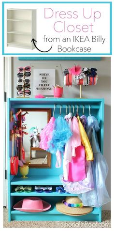 a blue bookcase with clothes hanging on it and the words dress up closet from an ikea billy