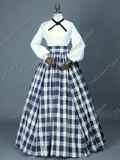 Long puff sleeved and collared Victorian dress shirt blouse Antique silver buttons down front and at cuffs High quality vintage country plaid patterned Victorian skirt in cotton blends Discrete zipper and matching button enclosure on skirt Chic black velvet neck tie included 45 inches (114 cm) from waist to hem ** This dress is pictured with a 6 -hoop skirt underneath to achieve the look. Hoop skirts are NOT INCLUDED with our dresses. ** The best way to tell which size fits the best is to measur Victorian Day Dress, Little Women Dresses, 1860s Fashion, Victorian Skirt, Victorian Costume, Hoop Skirt, Kris Kringle, Little Women, Tartan Dress