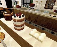 an animated kitchen scene with cakes and pies on the counter, along with utensils