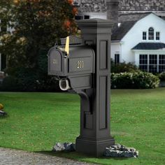 a black mailbox in front of a house