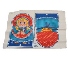 two towels with pictures of children on them, one in red and the other in blue