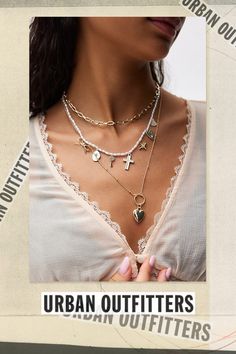 Set of three necklaces that layer together for a coquette look. Features Larsa layered charm necklace set Set of three necklaces Layer them together or wear on their own Adjustable length Content + Care Set of 3 Mixed metal, glass Avoid contact with water Imported Size Dimensions: 16" -18" l + extender | Larsa Layered Charm Necklace Set in Gold, Women's at Urban Outfitters White Charm Necklaces For Layering, Trendy Urban Outfitters Jewelry As Gift, Gold Necklace From Urban Outfitters As A Gift, Urban Outfitters Gold Necklace As A Gift, Three Necklaces, Mixed Metals, Layered Necklaces, Necklace Set, Charm Necklace