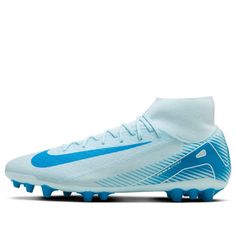 a white and blue nike soccer shoe on a white background with the word nike written in blue