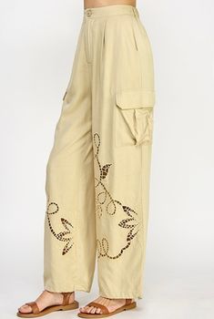 Introducing our exquisite Laser Embroidery Cargo Pants in sage taupe. These pants feature a unique laser embroidery design, adjustable cuffs, and plenty of pockets for all your essentials. The pleated back elastic waistband adds a touch of sophistication, with eyelet details for a luxurious finish. Elevate your wardrobe with these exclusive pants. 70% viscose 30% linen small waist 26" plus elastic, rise 12" insesm 30" Pants With Embroidery, Indian Photoshoot, Casual Chic Outfit, Chic Outfit, Cargo Pant, Embroidery Patches, Small Waist, Who What Wear, Cargo Pants