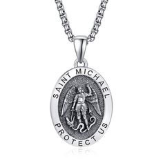 Experience timeless elegance with our retro sterling silver Saint Michael pendant necklace for men, meticulously crafted to blend traditional charm with modern sophistication, making it a perfect accessory for any occasion. This exceptional piece showcases a sleek design without stones, highlighting the intricate detailing of Saint Michaels emblem and the inspiring St Michael Protect Us inscription. Ideal for men who appreciate refined craftsmanship and the protective symbolism of this patron sa St Michael Pendant, Necklace Stand, Saint Michael, Necklace For Men, Patron Saints, St Michael, Men Necklace, Sleek Design, Timeless Elegance