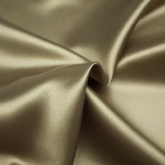 Wins is an olive green polyester lining fabric with a beautiful satin look. It's best to use this lining for jackets and coats. Composition: 100% PL Width: 152 cm Colour: olive green Pattern: solid Weight: 118 gr/m2 Our fabrics are sold per 10cm. Minimum order is 10cm for a sample size. To order 100cm of fabric, fill in 10 as a quantity. Your fabrics will be cut in one piece Materials Gown Style, Green Inspo, Fabric Board, Colour Combinations Fashion, Gold Aesthetic, Olive Green Color, Wedding Mood Board, Olive Color, Polyester Satin