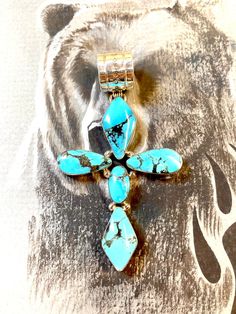 .925 sterling silver cross pendant with turquoise stones. Pendant only. Bohemian Sterling Silver Cross Jewelry, Bohemian Turquoise Cross Jewelry, Spiritual Turquoise Necklace With Cross Pendant Gift, Spiritual Turquoise Cross Pendant Necklace Gift, Bohemian Jewelry With Large Cross Pendant, Bohemian Turquoise Cross Pendant Jewelry, Bohemian Turquoise Cross Pendant Necklace, Spiritual Cross Turquoise Necklace For Gift, Spiritual Turquoise Cross Necklace As Gift