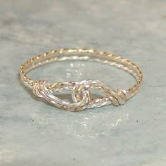 a gold ring sitting on top of a table