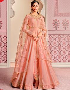 Peach Pant style Suits Russian Silk Salwar Kameez in Embroidery, Stone & Lace Work:Arabic Attire #howtomakeshalwarkameez #latestsalwarkameezfashions #designerwomen'sindiansuits #designersuitsonlineindia #suitstitchingdesigns #differentpatternsofsuits #indianlatestsuits #stitchsuitdesign #designerwomenssuitsimages #ladiessuitsalwar #fashiondesignersuit #shalwarwomen #boutiquesuitsdesign #fashiondesigningsuit #southindianfashiononlineshopping #ladysuitsdesigns Anarkali Lehenga Gowns, Peach Anarkali, Peach Pants, Silk Anarkali Suits, Celana Fashion, Silk Anarkali, Anarkali Lehenga, Designer Anarkali Suits, Silk Bottoms