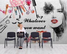 a woman sitting on a chair in front of a wall with makeup and cosmetics images