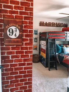 a bedroom with bunk beds and a sign on the wall that reads harrison's 9