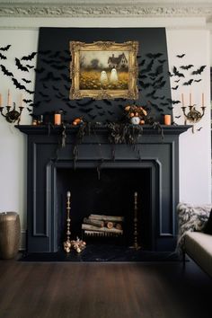 a living room with a fireplace decorated for halloween