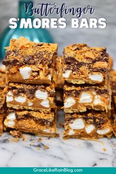 chocolate and marshmallow s'mores bars stacked on top of each other