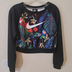 Nike Sportswear Tropical/Floral Print Crop Top Crew Sweater Size Small For Women Excellent Condition No Flaws Hawaiian-Flowers-Jungle-Multi- Palm Trees Nike Swoosh On The Front. Ribbed Collar. Solid Sleeves With Ribbed Wrist Cuffs Polyester Fabric For Durability And Quick Breeze. Black Sportswear Tops For Leisure, Black Athleisure Tops For Leisure, Black Sportswear Sweatshirt For Leisure, Spring Sportswear Tops For Leisure, Spring Leisure Sportswear Tops, Fitted Black Sweatshirt For Sports, Black Long Sleeve Activewear For Leisure, Black Long Sleeve Leisure Activewear, Nike Sports Sweatshirt For Spring