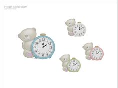 there are three clocks with teddy bears on them and one has a clock in the shape of a bear