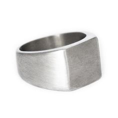 Something Simple yet something sleek. This stainless steel ring radiates class and sophistication with a touch of grunge with a brushed & rugged finish. Personalize it with your own custom stamp on the inside or outside of this ring, or even add something to the ring face, please see all the details below. If you select a custom engraving, please note there are different charges depending on the amount of characters you choose and a limit of characters on each piece of jewelry. I offer the alpha Antique Gold Rings, Antique Silver Necklace, The Ring Face, Antique Silver Rings, Custom Stamp, Silver Ring Designs, Silver Rings Simple, Engraved Ring, Sterling Silver Mens Rings