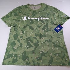 Show Off Your Sporty And Modern Style With This Champion Camouflage T-Shirt In Size Xl. The Short Sleeve Shirt Features A Crew Neckline And Is Made With Comfortable And Durable Cotton Material. It Is Machine Washable For Easy Care And Maintenance. This Shirt Is Perfect For The Summer, Fall, And Spring Seasons And Comes In A Trendy Green Color. The Graphic And Logo Accents Add To The Shirt's Uniqueness, Making It A Great Addition To Any Collection. Whether You're Hitting The Gym Or Running Errand Casual Camouflage Short Sleeve T-shirt, Camouflage Graphic Print Crew Neck T-shirt, Camouflage All Over Print Cotton Tops, Camouflage All-over Print Cotton Tops, Camouflage Short Sleeve Top With Letter Print, Camouflage Crew Neck T-shirt With Letter Print, Camouflage Crew Neck Graphic Tee, Casual Camouflage Shirt With Graphic Print, Camouflage Cotton T-shirt With Letter Print