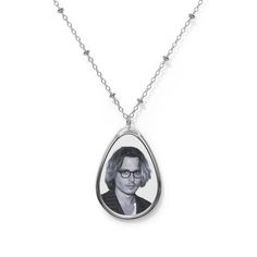 Johnny Depp Necklace | Celebrity Jewelry Gift Idea | Ornament for Donnie Brasco Movie Fans | Custom Necklace Gift Idea  Elevate your wardrobe or surprise DIY lovers with this exquisite, custom necklace. It features an ellipse-shaped pendant made from durable zinc alloy, offering a touch of sophistication. The gleaming chain, crafted from the same high-quality material, ensures elegance and comfort around the neck 🌟. The heart of this piece is its white aluminum print surface, ready to be person Personalized Oval Pendant Jewelry, Sterling Silver Charm Necklace For Keepsake, Sterling Silver Keepsake Charm Necklace, Customizable Silver Keepsake Necklaces, Customizable Silver Necklace For Keepsakes, Personalized Silver Teardrop Necklace, Personalized Teardrop Pendant Necklace For Keepsake, Personalized Silver Necklace With Oval Pendant, Silver Oval Pendant Necklace For Personalized Gift