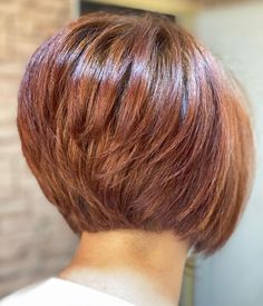 Polished Short Red Stacked Bob Reverse Stacked Bob Haircut, Inverted Stacked Bob Haircut For Fine Hair, Short Layered Bob Back View, Short Bob Red Hairstyles, Bob With Flipped Ends, Bob Cut Hair, A Line Bob Short Stacked, A Line Bob Short Stacked Round Faces, Stacked Bob With Bangs