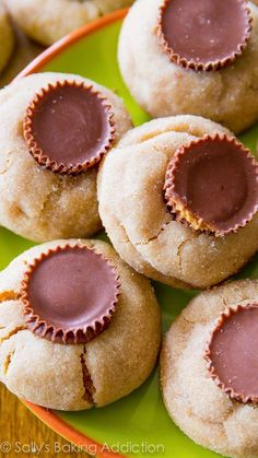 some peanut butter cookies on a green plate