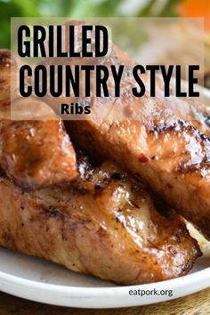 grilled country style ribs on a plate with text overlay that reads grilled country style ribs