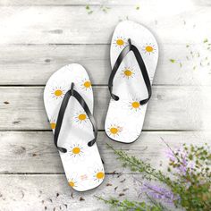 Embrace unparalleled comfort throughout your summer adventures with these distinctive flip flops. Designed for ease and style, these sandals feature a convenient slip-on design, ensuring hassle-free wear during all your summer escapades. The cushioned footbed promises all-day comfort, making these flip flops a go-to choice for those long, sun-soaked days. Crafted with top-notch materials, including EVA, polyester, and PVC, these flip flops boast a 5/8" (15 mm) thick EVA sole with a textured bott Trendy Lightweight Spring Flip Flops, Casual Flower Shaped Flip Flops For Spring, Casual Flower-shaped Flip Flops For Spring, Comfortable White Flip Flops For Spring, Comfortable White Spring Flip Flops, Lightweight Spring Vacation Flip Flops, Lightweight Adjustable Flip Flops For Spring, Summer Vacation Flower-shaped Flip Flops, Designer Flip Flops