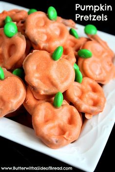 pumpkin pretzels with green candies and candy