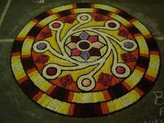 a circular rug with an abstract design on it