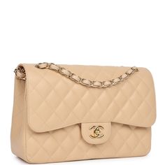 This Jumbo Classic Double Flap bag is in beige caviar leather with gold tone hardware and features a front flap with signature CC turnlock closure, half moon back pocket, and adjustable interwoven gold tone chain link and beige leather shoulder strap.The interior is lined in beige leather with a "love letter" zipper compartment under the first flap, an "outer" slit pocket under the second flap, and an interior compartment with two open pockets separated by a "lipstick" compartment.Collection: 19-series (2014) Origin: FranceCondition: Never wornAccompanied by: Chanel box, Chanel dustbag, carebook, felt, COA card, retail UPCMeasurements: 12" width x 8" height x 3.5" depth; 23" strap drop: 23" (13" doubled) Ck Bags, Chanel Jumbo, Chanel Box, Crossbody Handbags, Gold Chanel, Handbags Women, Stylish Shoulder Bag, Purse Crossbody, Leather Thread