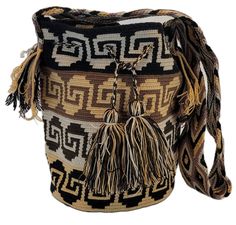 a brown and black bag with tassels on it