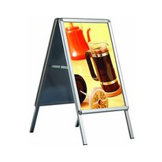 a - frame sign with an image of a glass of coffee on the front and side