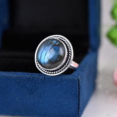 》D E T A I L S《 ✦Stone :-  Labradorite ✦Stone Size:-15 MM ✦Stone Shape:-Round ✦Stone Type:- Natural ✦Metal:- Silver ✦Purty:- 925 Sterling Silver ✦Weight:- 8 Gram (Approx) ✦Ring Size:- All Size Available 》C U S T O M I Z E O R D E R《 We accept custom and personalized order. It can be change in the gemstone, earring design and earring size. Please send us message if you are interested in a custom creation. 》 P A C K A G I N G 《 Your jewelry will be nicely packaged. If one or more items are gifts, Round Labradorite Moonstone Ring Stamped 925, Labradorite Crystal Ring With Natural Stones, Round Labradorite Ring As Gift, Ring Everyday, Fancy Gifts, Ring Birthstone, Labradorite Ring, Labradorite Stone, Ring Gemstone