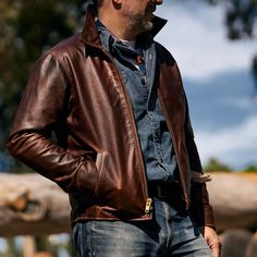 Indulge in the luxurious embrace of our men's leather jacket, crafted for a soft touch and supple feel that seamlessly merges timeless style with contemporary features. ► Material: Immerse yourself in the sumptuous texture of Full Grain Lamb Skin Leather. ► Zipper: Elevate your experience with a high-quality heavy-duty YKK zipper for secure closure. ► Lining: Enjoy a cocoon of comfort with a soft polyester lining on the inside. ► Style: Move freely and revel in optimal comfort year-round, whether it's the warmth of winter or the breeze of summer. ► Size: Navigate the perfect fit by referring to our comprehensive size chart, conveniently located in the last image. Contact us for personalized assistance in selecting the ideal size if needed. 1: Sizing: Choose from a range of sizes: XS, S, M, Personalized Gifts For Him, Leather Jacket For Men, Personalized Gifts For Men, Men's Leather Jacket, Vintage Americana, Personalised Gifts For Him, Brown Vintage, Jacket For Men, Genuine Leather Jackets