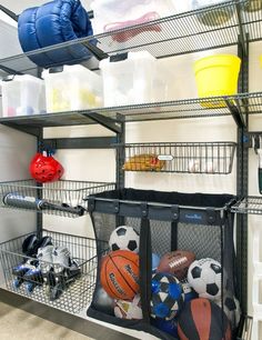 there are many sports balls and toys in the storage area