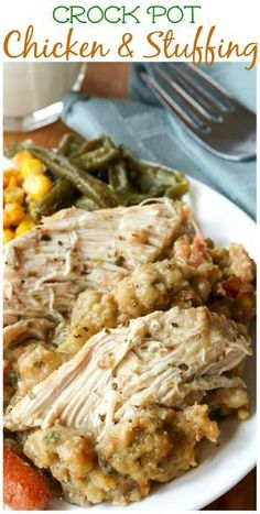 crock pot chicken and stuffing on a white plate with green beans, carrots and potatoes