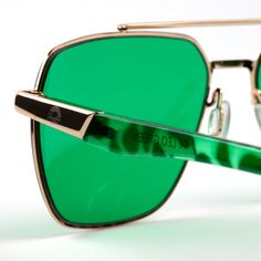 Frame Style Highlights: Gender: Unisex Frame: Gold Metal Wireframe Lens Color: Green UV Rating: UV400 Fit / Size: Large In the Box: Sunglasses & Microfiber Pouch Lens Width: 60mmLens Height: 45mmBridge Width: 15mmArm Length: 150mm Trendy Green Sunglasses For Outdoor, Trendy Green Outdoor Sunglasses, Modern Green Tinted Shield Sunglasses, Green Anti-reflective Cat Eye Sunglasses, Green Aviator Sunglasses With Uva Protection, Green Cat Eye Sunglasses With Anti-reflective Coating, Modern Green Sunglasses With Anti-reflective Coating, Modern Green Anti-reflective Sunglasses, Modern Green Polarized Shield Sunglasses