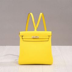 Buy 2021 Yellow Belt Lock Leather Mini Backpacks Worldwide Free shipping and return, color: Yellow , material: Genuine Leather Luxury Yellow Shoulder Bag For Summer, Yellow Leather Rectangular Backpack, Yellow Rectangular Leather Backpack, Yellow Rectangular Backpack, Yellow Satchel Backpack For Daily Use, Yellow Leather Bag For Spring, Yellow Luxury Bag For Spring, Spring Yellow Leather Bags, Yellow Luxury Spring Bag