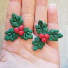 Holly/mistletoe earrings are perfect for the holiday and Christmas season!  Handmade one of a kind polymer clay earrings. Made with green and red clay. These come with a hypoallergenic earring stud post. Made with love in Michigan ❤️ Mistletoe Earrings, Earrings Ideas, Valentines Earrings, Polymer Clay Christmas, Earring Stud, Earring Studs, Red Clay, Hypoallergenic Earrings, Gold Geometric