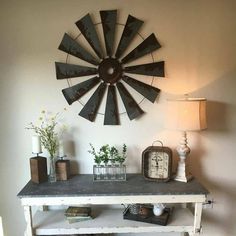 a room with a table and clock on the wall